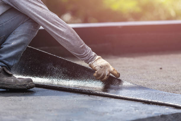 Professional Waterproofing technician working in Rosemount, OH